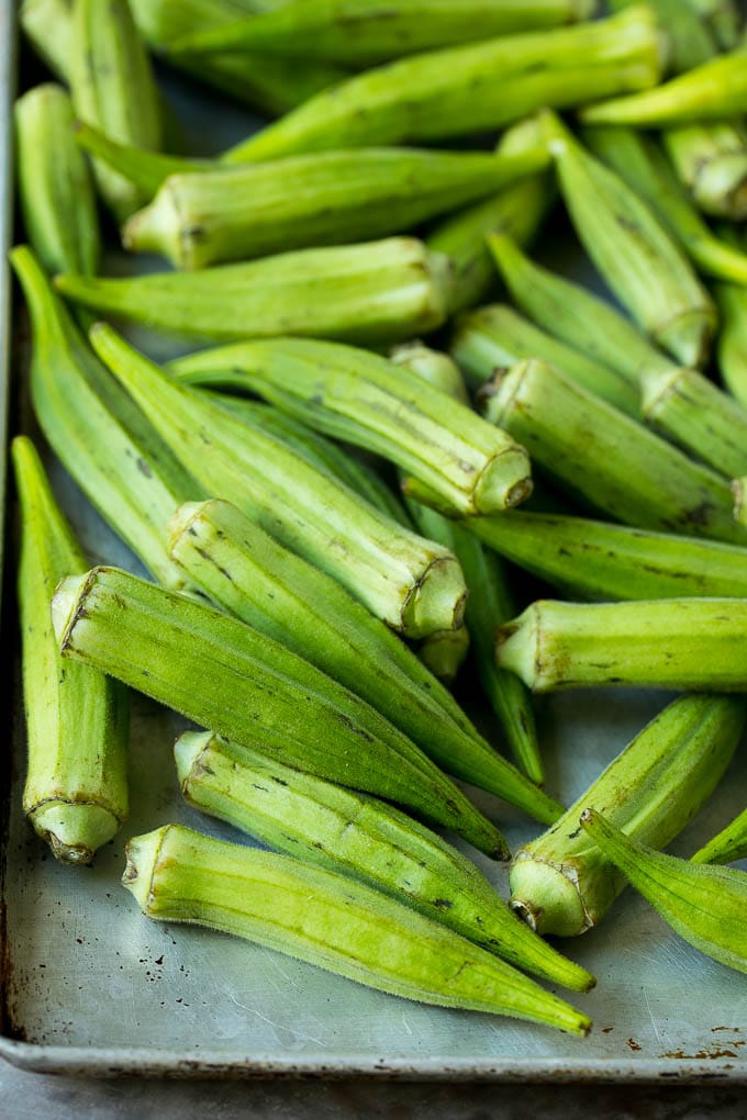 Fried Okra Recipe #okra #appetizer #sidedish #uzhal Okra pods on a sheet pan.