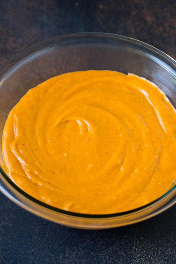 Pumpkin Cupcakes Recipe | Pumpkin Cake #cake #cupcakes #pumpkin #frosting #baking #fall #thanksgiving #uzhal A bowl of batter.