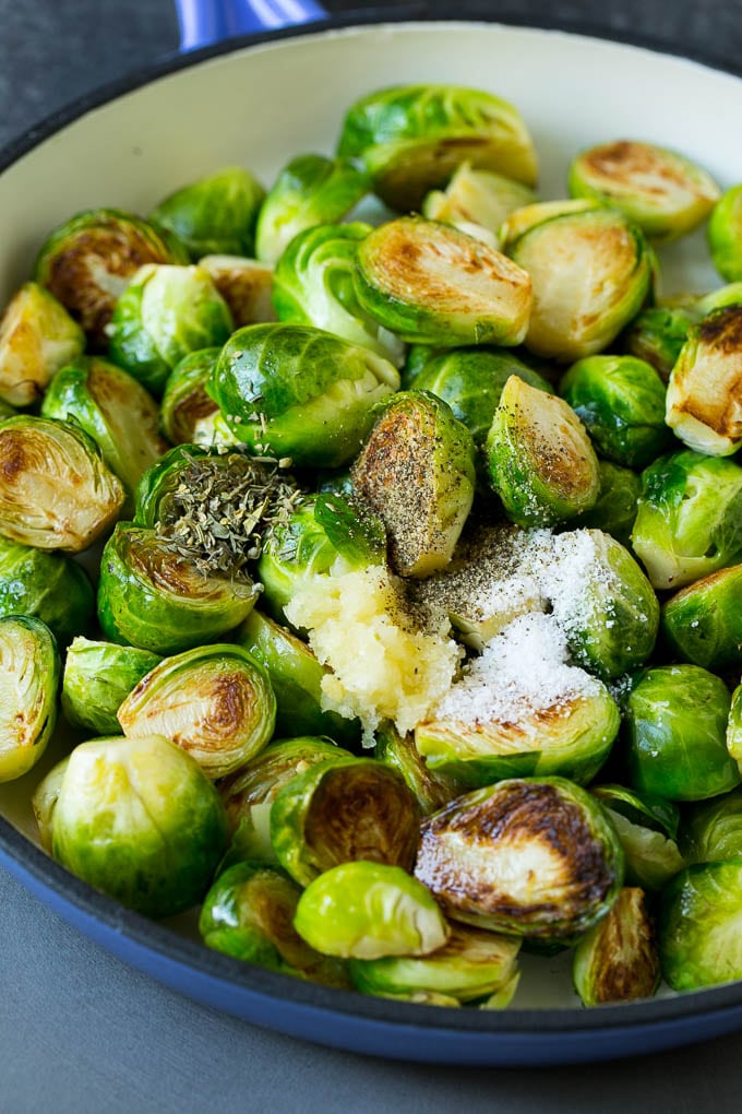 Sauteed Brussels Sprouts Recipe | Brussels Sprouts Side Dish #brusselssprouts #sprouts #veggies #sidedish #garlic #vegetarian #dinner #uzhal Sprouts in a pan seasoned with salt, pepper, garlic and dried herbs.