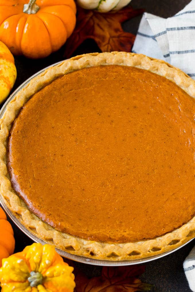Homemade Pumpkin Pie Recipe | Pumpkin Pie #pie #pumpkin #baking #thanksgiving #fall #dessert #uzhal A whole pumpkin pie in a flaky crust.