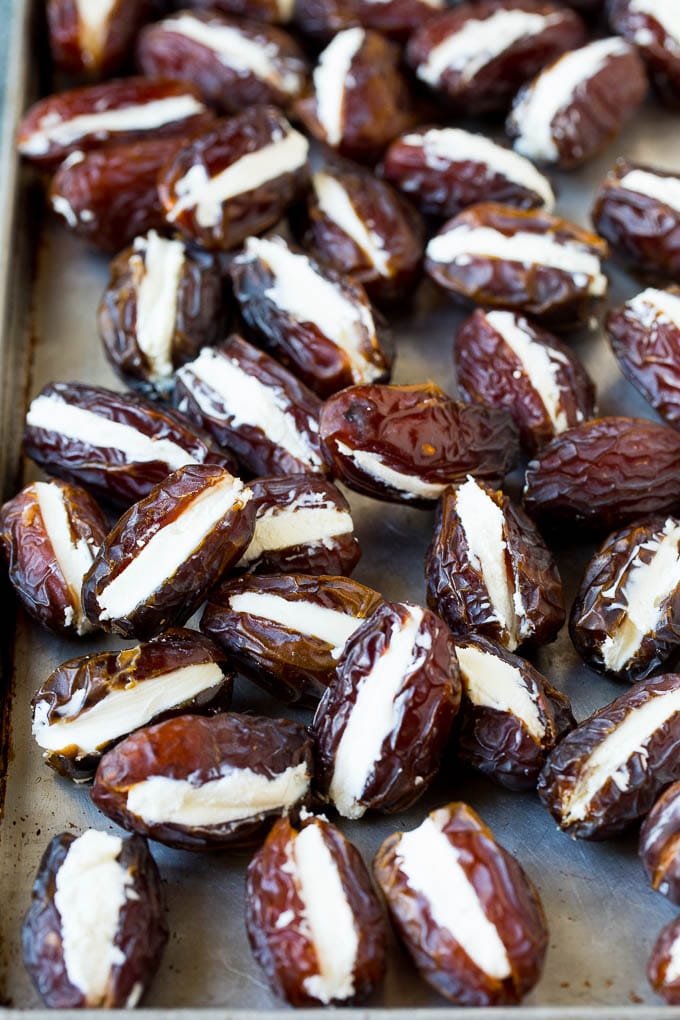 Bacon Wrapped Dates #appetizer #bacon #dates #cheese #uzhal Dates cut in half and filled with goat cheese.