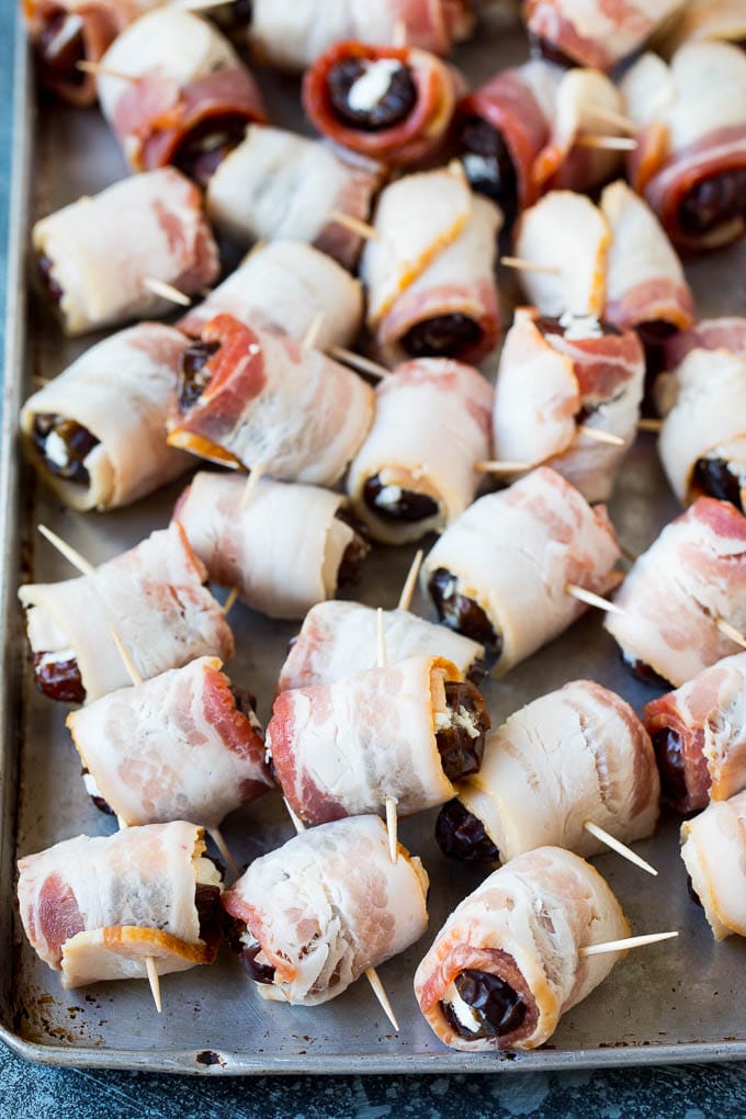 Bacon Wrapped Dates #appetizer #bacon #dates #cheese #uzhal Dates wrapped in bacon and secured with toothpicks.