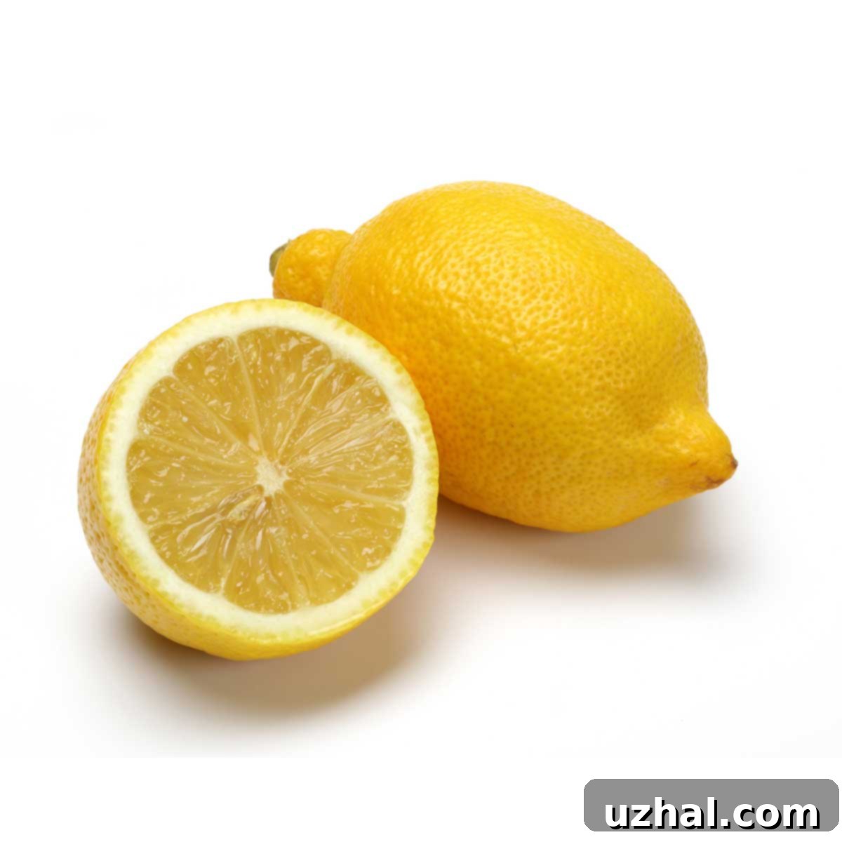 A vibrant, fresh lemon symbolizing the key ingredient and zesty flavor of the lemon cream filling for the cake.
