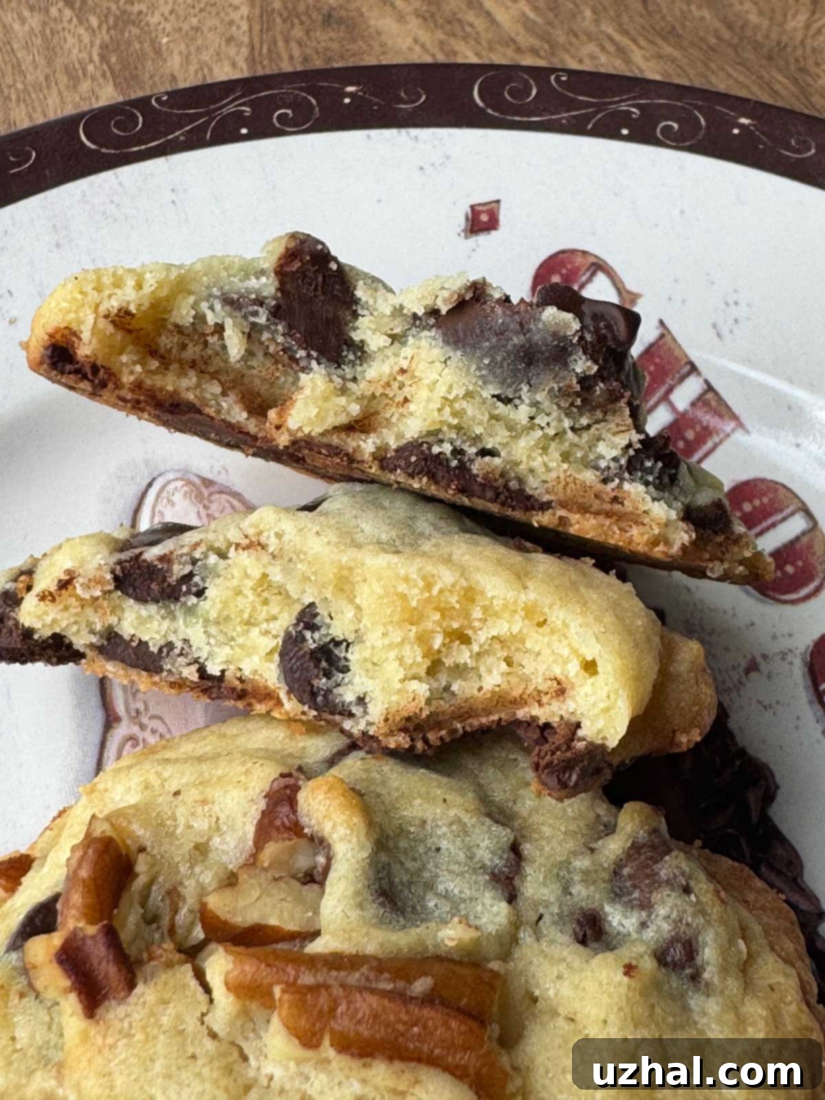 Cross-section of some chocolate chip cookies made with a combination of butter and butter powder.