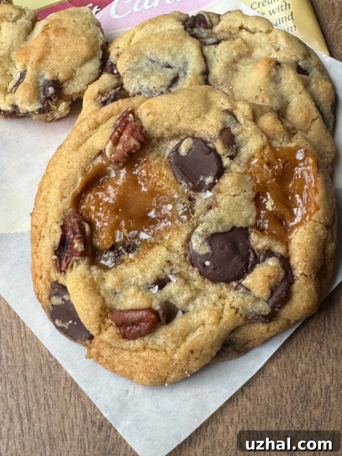 Salted Caramel Chocolate Chunk Cookies, warm and gooey, topped with sea salt.