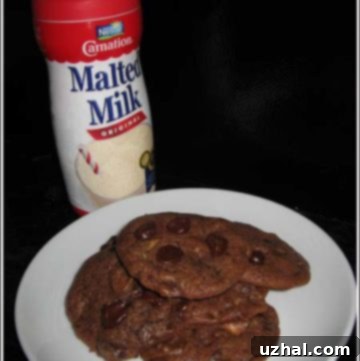 Freshly baked Chocolate Malt Whopper Cookies on a cooling rack