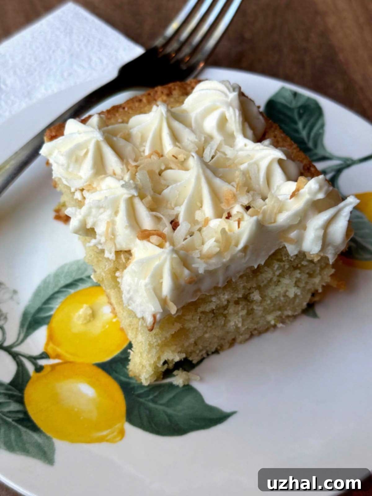 Slice of frosted Key lime snacking cake recipe.