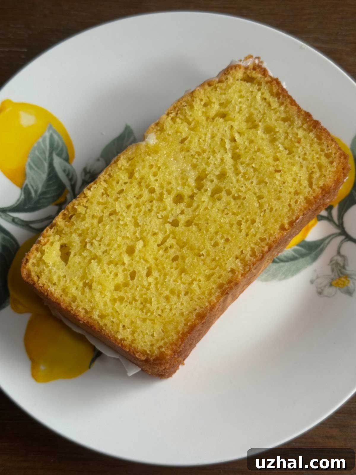 A perfectly sliced piece of the Starbucks copycat lemon loaf cake, showcasing its moist crumb and even texture.
