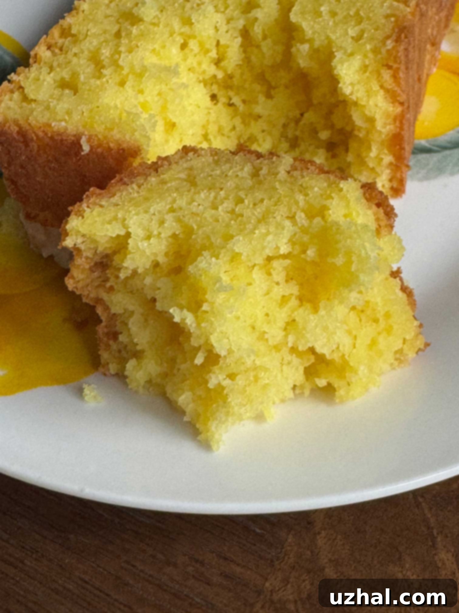 Close-up of the texture of the copycat Starbucks lemon loaf cake, revealing its fine, moist crumb.