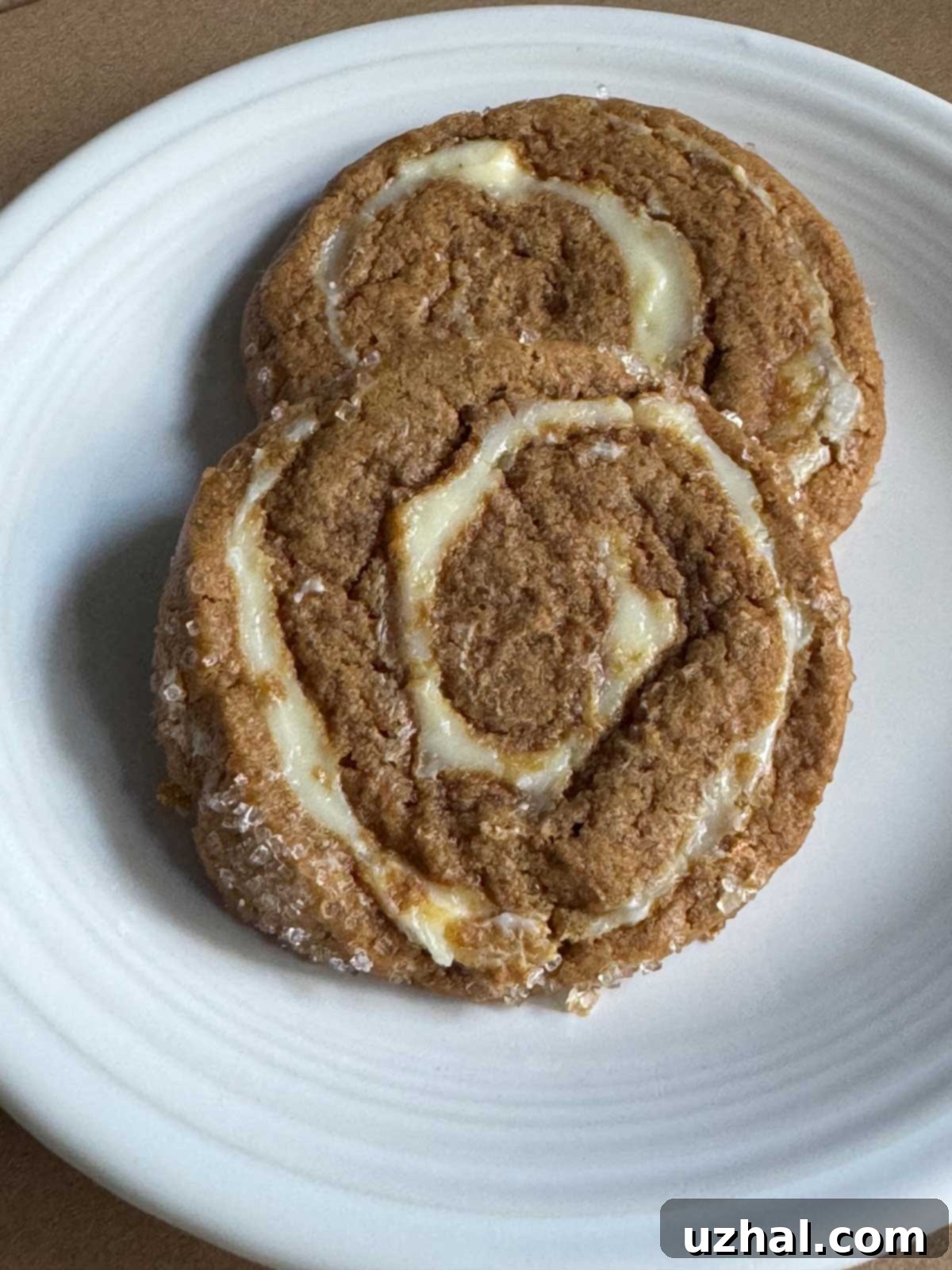 Cheesecake Ginger Cookies are soft, spicy cookies with a pinwheel of cream cheese, beautifully arranged.
