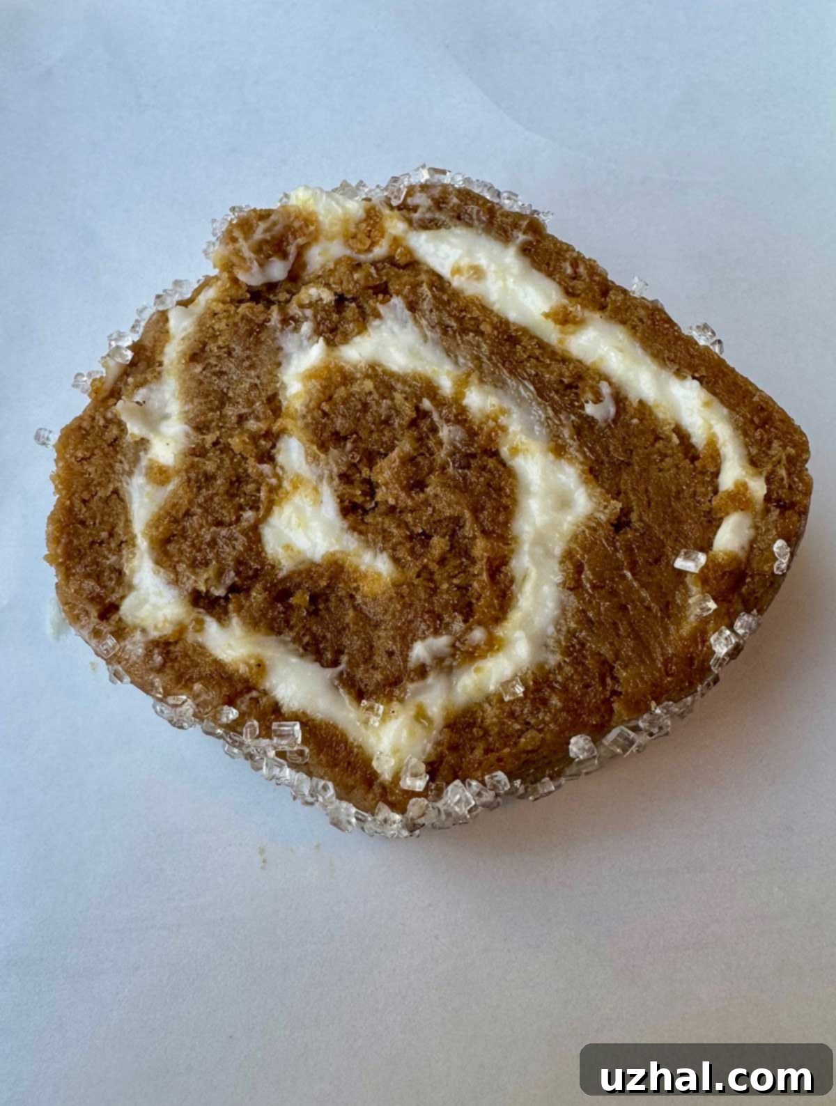 Jelly roll slice and bake ginger cookies dough, showing the cream cheese swirl before baking.