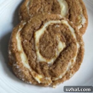 Cheesecake Ginger Cookies are soft, spicy cookies with a pinwheel of cream cheese.