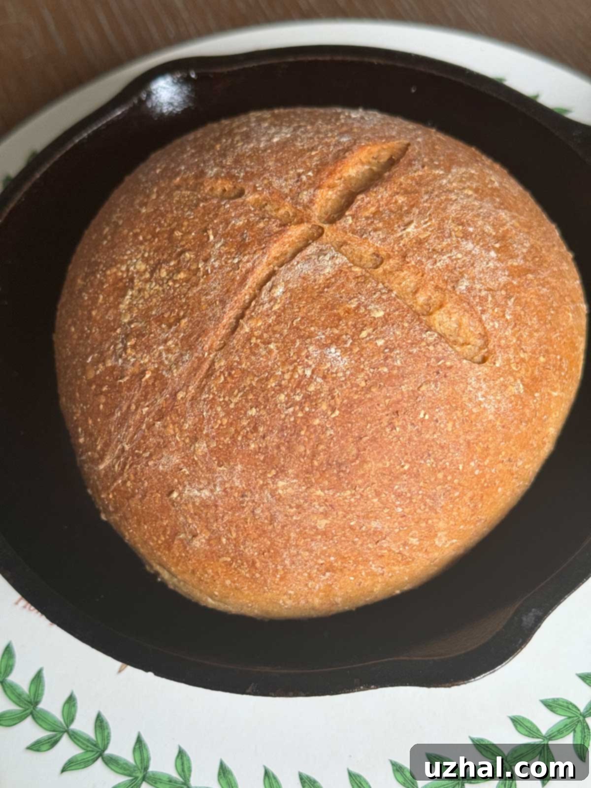 Freshly baked Shiner Bock Beer Bread on a cutting board, ready to be sliced.