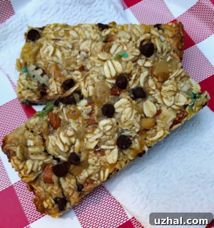 Delicious homemade condensed milk granola bars, golden brown and perfectly cut into squares.