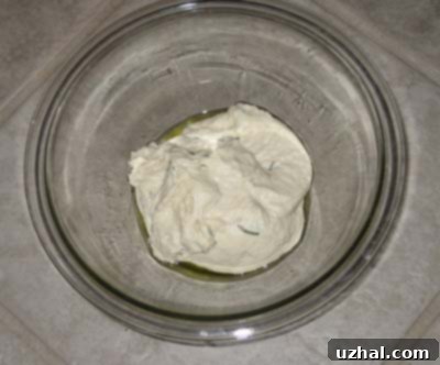 rosemary focaccia dough rising in a bowl