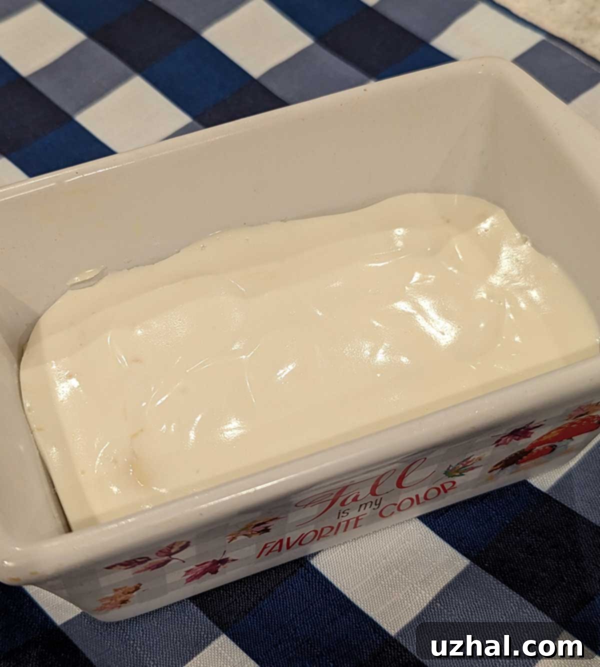 Assorted mini loaf pans, ready for baking cheesecake