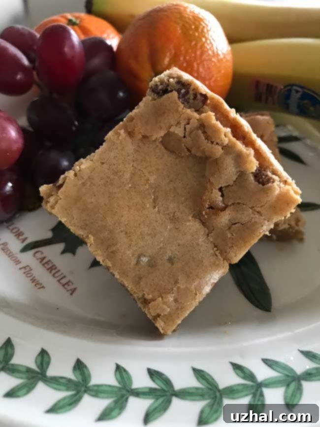 Ingredients for Betty Crocker Praline Bars laid out on a kitchen counter, including brown sugar, flour, and nuts