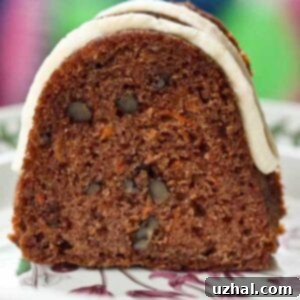 A simple carrot Bundt cake recipe with a Nothing Bundt Cakes style cream cheese frosting.