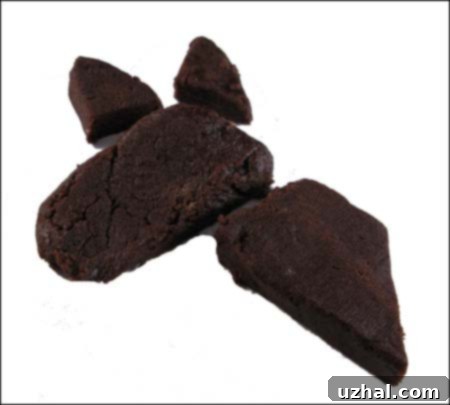 Detailed step-by-step image demonstrating how to shape cookie dough into a horse head, including adding ear pieces.