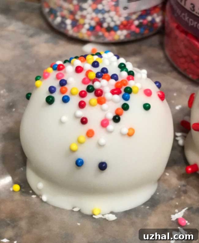 Close-up of Golden Oreo Truffles with sprinkles