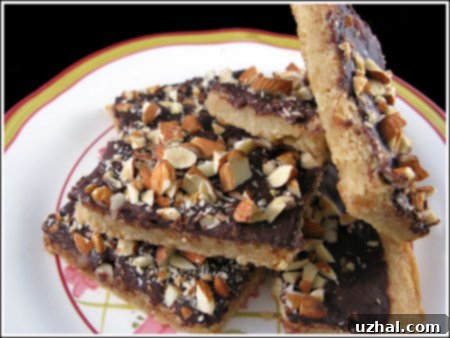 Buttery Shortbread Toffee Bars adapted from a classic Tasha Tudor recipe, topped with chocolate and nuts.