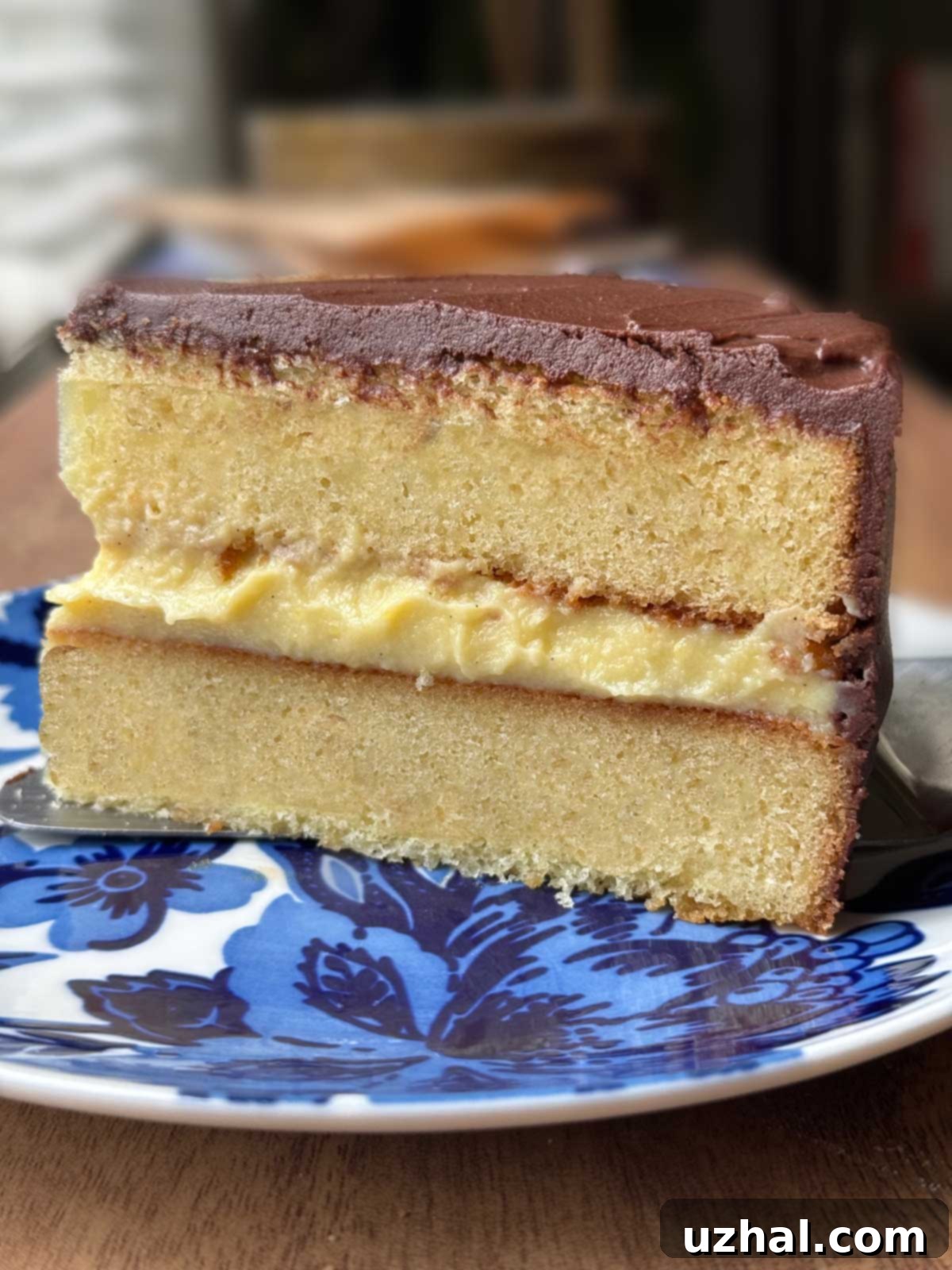 Slice of Boston Cream Pie from a recipe in The Joy of Cooking edition 2019