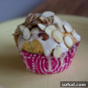 White Lily Orange Cranberry Crunch Muffins with a sweet orange glaze and toasted almonds.