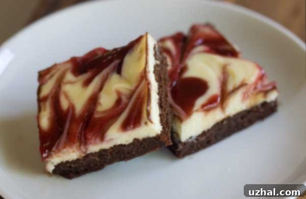 Close-up of freshly baked White Chocolate Raspberry Cheesecake Brownies