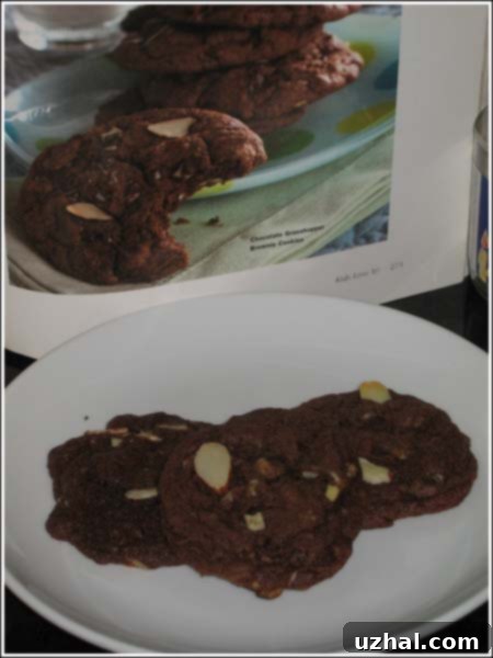 Dark chocolate cookies with green mint frosting, a festive and refreshing treat.