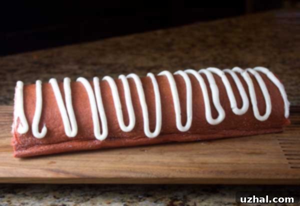 Red Velvet Cake Roll with Whipped Cream Cheese Icing
