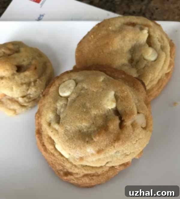 Homemade White Chocolate Macadamia Nut Cookies on a Cooling Rack