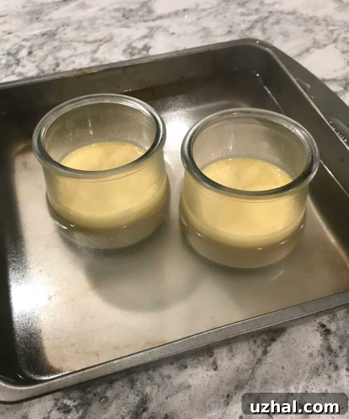 Crème Brûlée for Two served in upcycled Yoplait Oui jars, showcasing creative ramekin use.