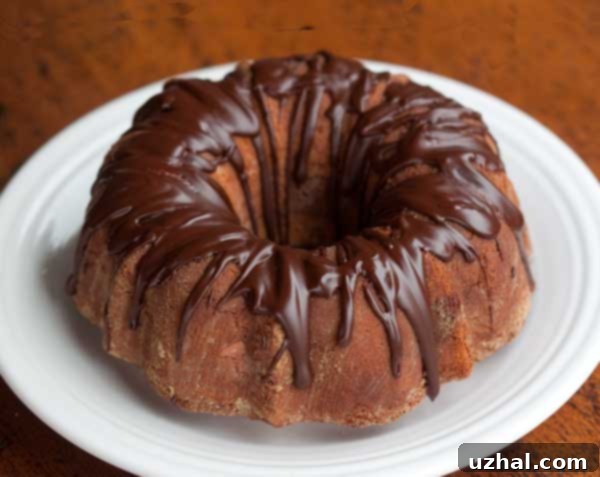 Golden-brown marble pound cake, perfectly baked and ready to slice.