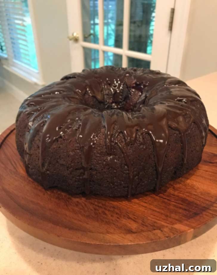 Rich and decadent Chocolate Covered Cherry Bundt Cake with a smooth ganache glaze