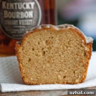 A delicious slice of Brown Sugar Bourbon Loaf with a rich brown crust and moist interior.