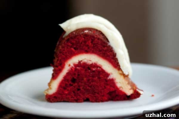 Red Velvet Cream Cheese Bundt Cake with a visible cheesecake swirl