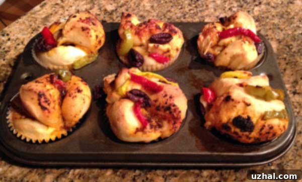 Close-up view of freshly baked focaccia muffins cooling on a rack