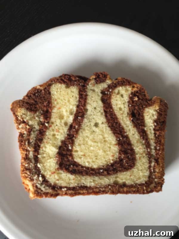 Close-up of baked Marbled Olive Oil Cake showing the chocolate and vanilla swirl
