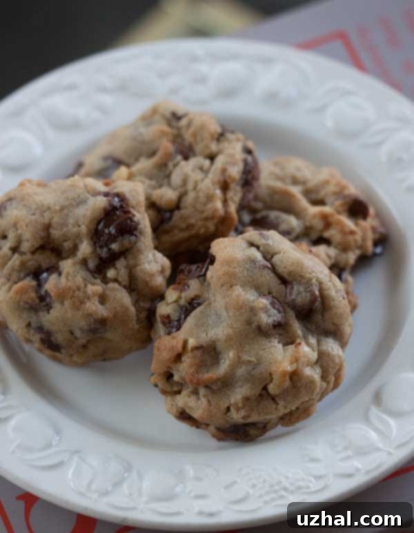 Deliciously thick milk and bittersweet chocolate chip cookies, a family favorite homemade recipe