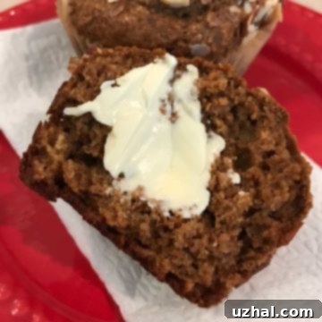 Beautifully baked Coarse Bran Muffins, topped with sliced almonds and dried cranberries.