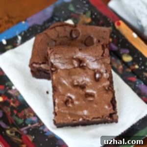 Very fudgy gluten-free fudge brownies made with 1:1 gluten-free flour