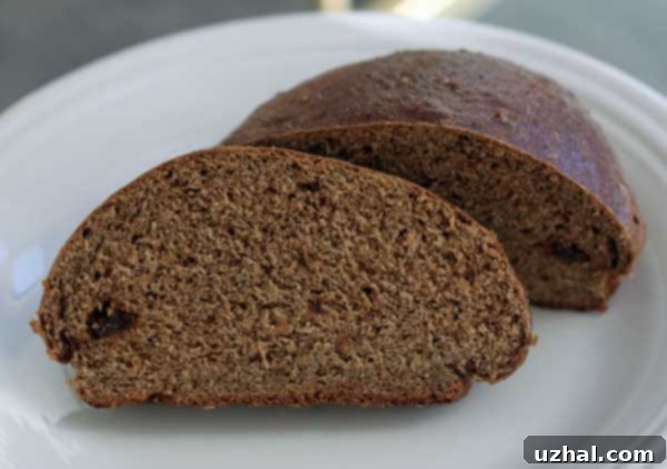 Russian Black Bread, freshly baked loaf with a shiny crust