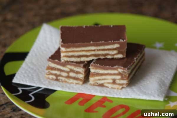 Crispy layers of Club Cracker Bars, a sweet and salty no-bake dessert