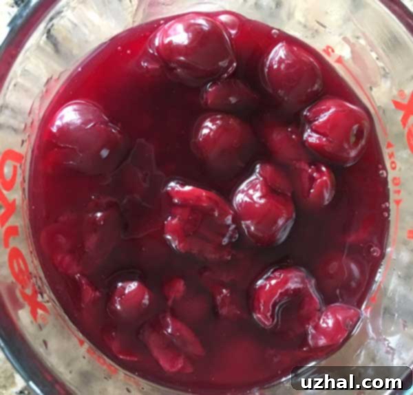 Cherry Pie Filling made with jarred cherries, showcasing the rich color and texture.