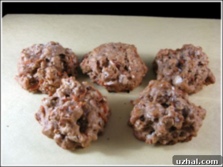 Delicious Carrot Ginger Spice Cookies with a hint of warmth from ginger and cinnamon, studded with pecans.