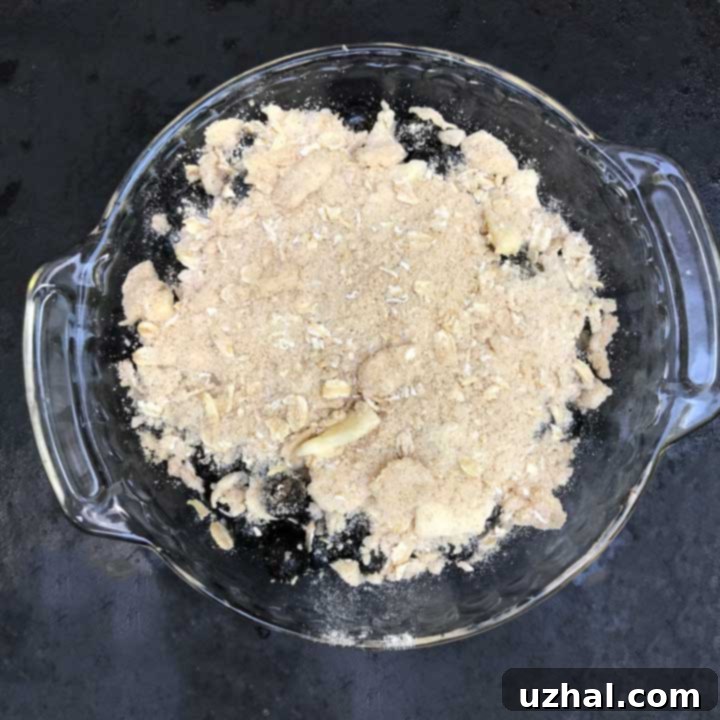 Small batch blueberry crisp in a mini pie plate