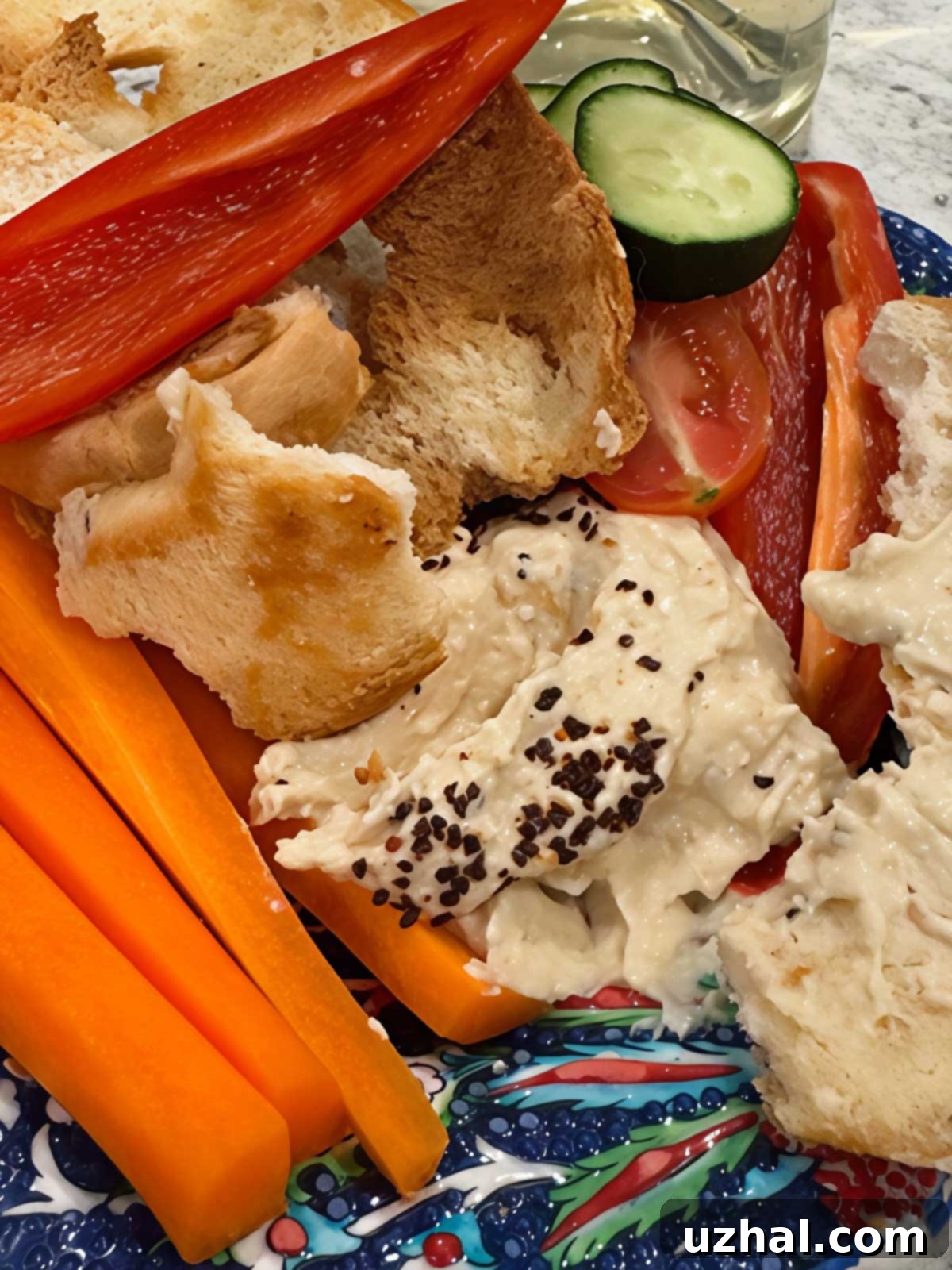A recipe for hummus with cottage cheese in it for extra protein and fewer calories.