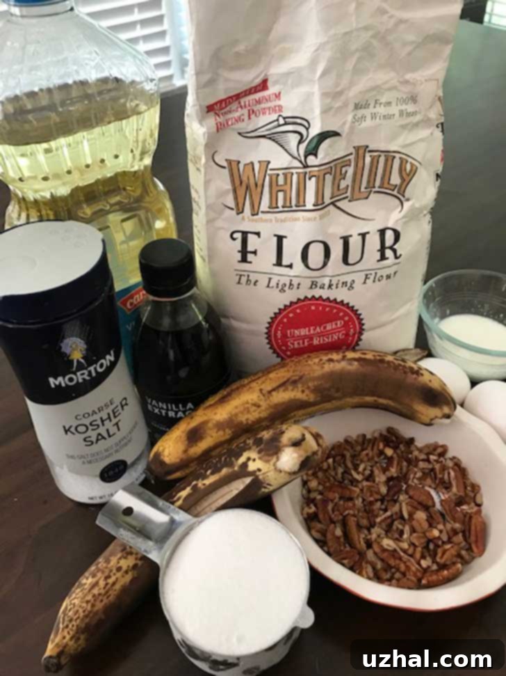 Ingredients for Self-Rising Flour Banana Bread, laid out on a surface.