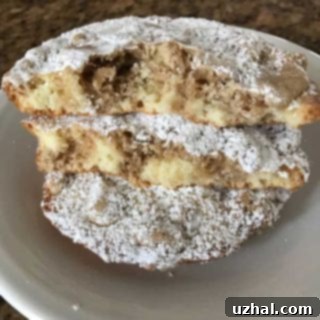 New York Style Crumb Cake Muffin Tops, finished and dusted with confectioners' sugar