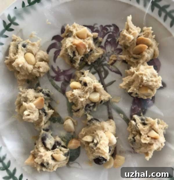 Portioned gluten-free chocolate chip cookie dough ready for chilling